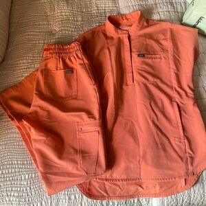 Figs scrubs - sunset drift sold.